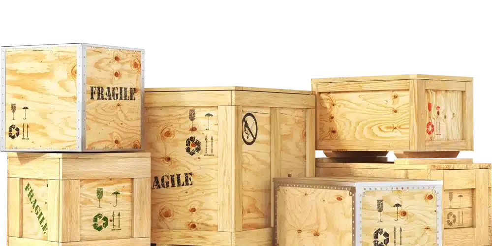 Heavy-duty wooden crate lifted by overhead crane in industrial facility — large-scale wooden crating solutions for machinery transport in Dammam and Saudi Arabia